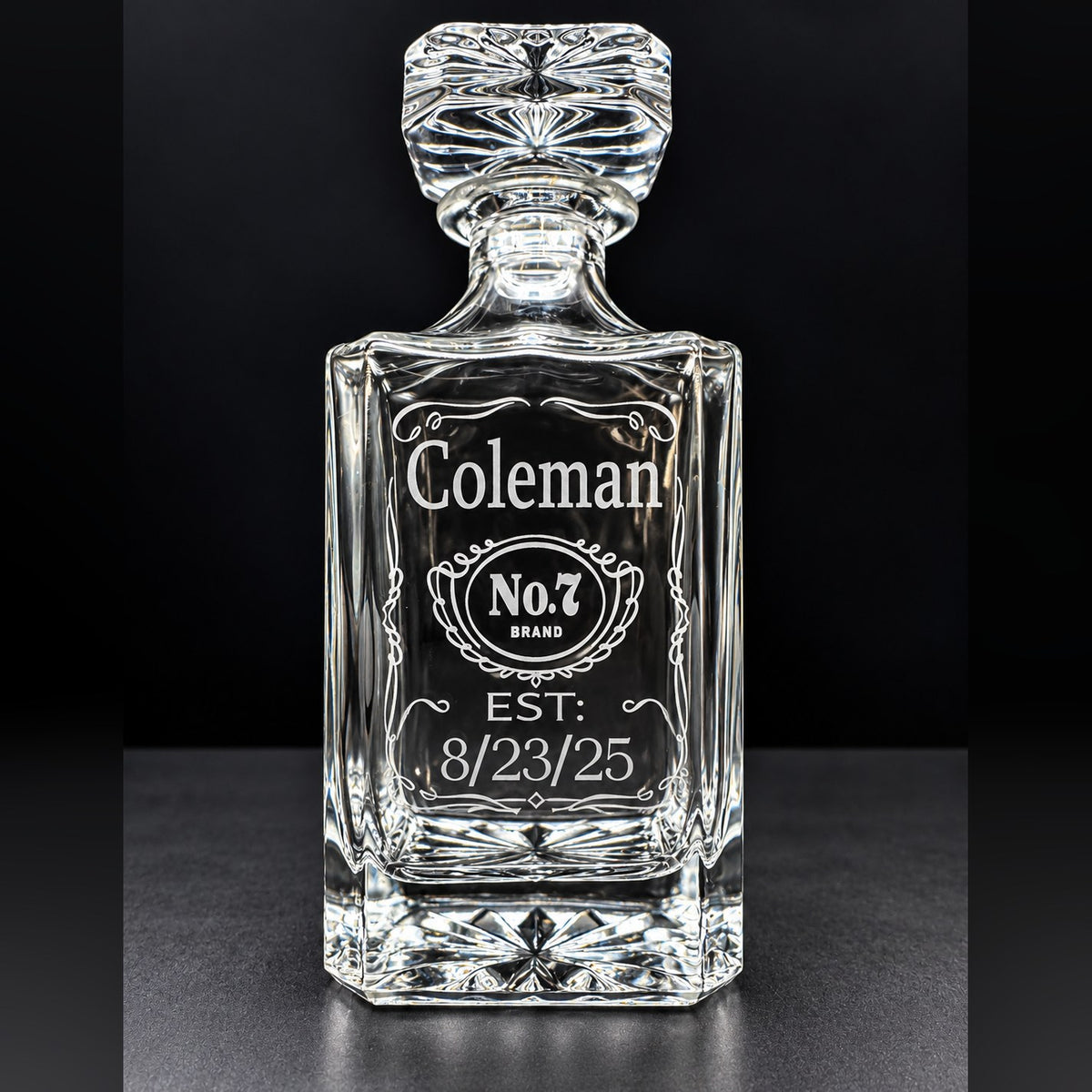750 ml engraved square glass decanter personalized with Coleman name, No. 7 label and 8/23/25 date, studio shot on dark background