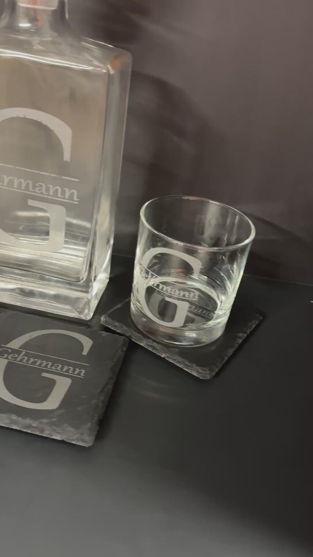 Video of the engraved square glass decanter, two rocks glasses, and slate coasters