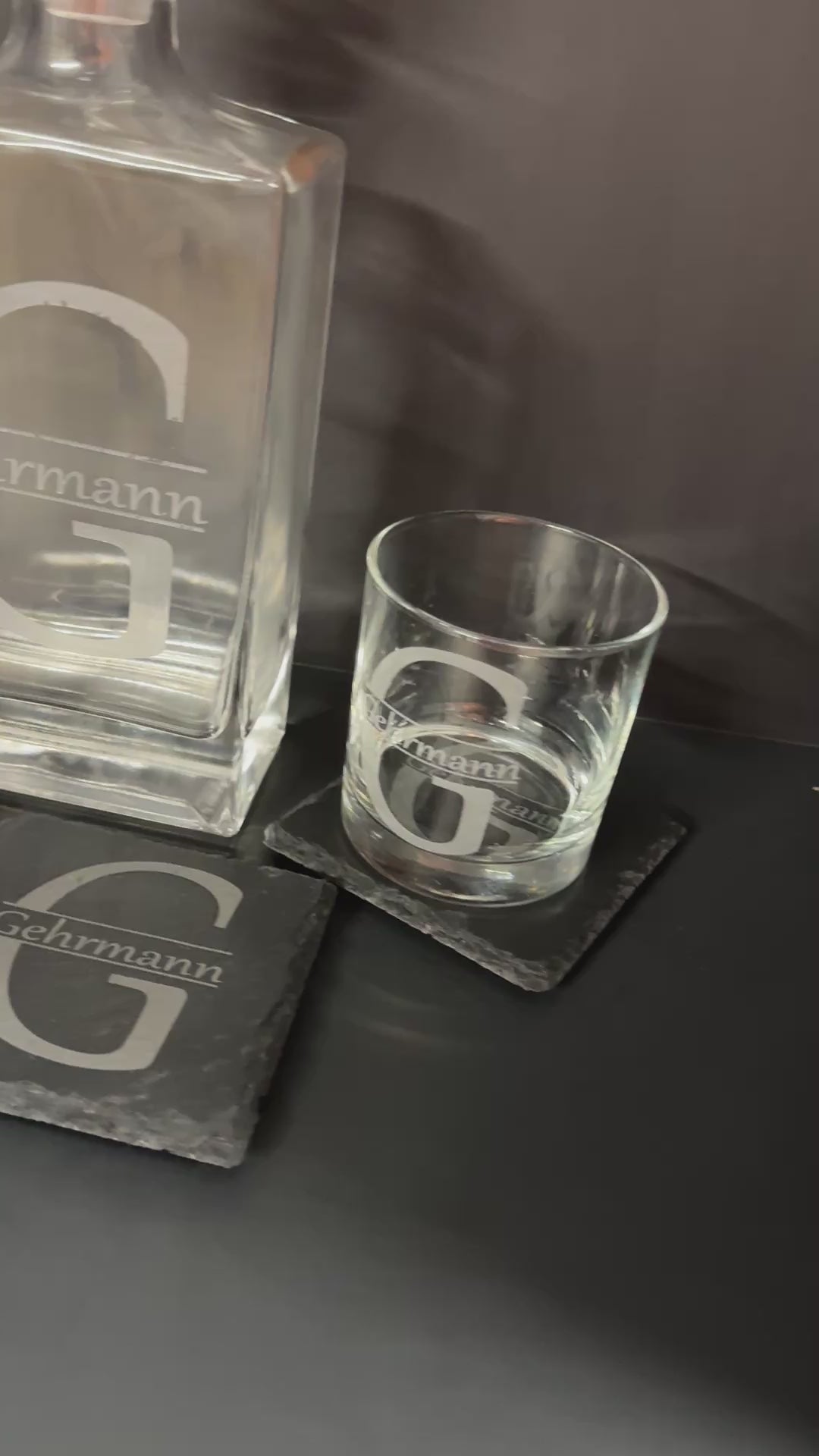 Video of the engraved square glass decanter, two rocks glasses, and slate coasters